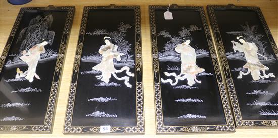 Two pairs of Japanese inlaid black lacquered wall plaques